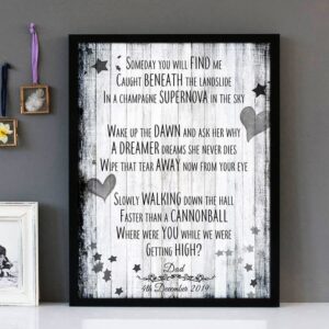 Framed wall art with black text of the song lyrics from Champagne Supernova by Oasis, with a distressed wooden boards background and decorative love hearts.