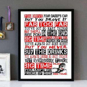Framed wall art with black, red and white text of the song lyrics from Big Time by Rudi.