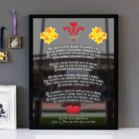Framed wall art with white text of the song lyrics of the Welsh National Anthem with the Principality Stadium in the background.